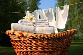 Photo with laundry basket and clothesline holiday home laundry service